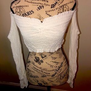 Too cute crop white tube- style top with off-shoulder puffy sleeves.